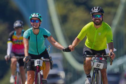 STP 2025 Tyler and Katie hold hands. Photo by Kyle Elfman