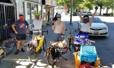 Four volunteers at the Pedaling Relief Project