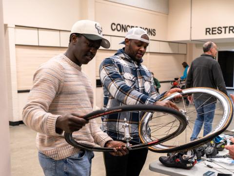 Bike Swap shoppers browse tires.
