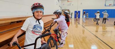 Smiling child in the Let's Go program