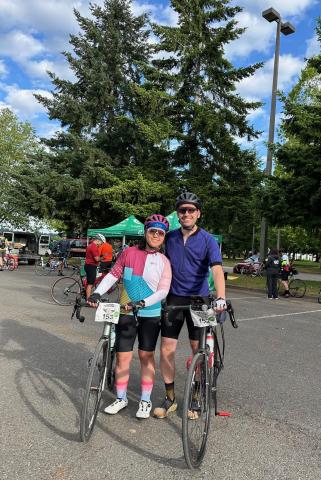 Jen and Adam pose on a bike ride