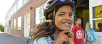 Girl with bike helmet